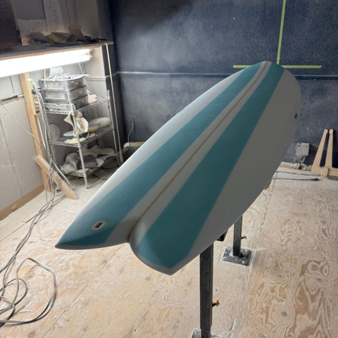"Alchimie Surf Longfish 7'0'' tail detail – twin fish tail design for improved speed and maneuverability"
